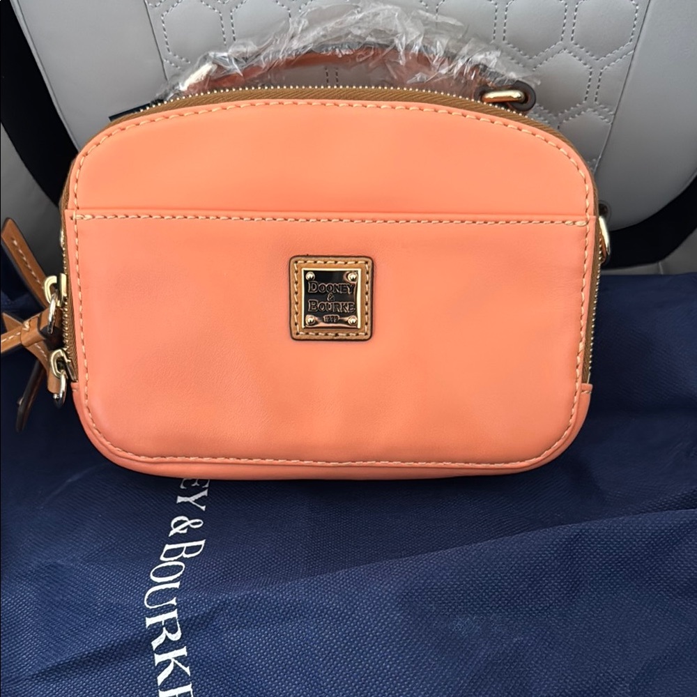 Dooney & Bourke Orange Crossbody Bag with Minimalist Design